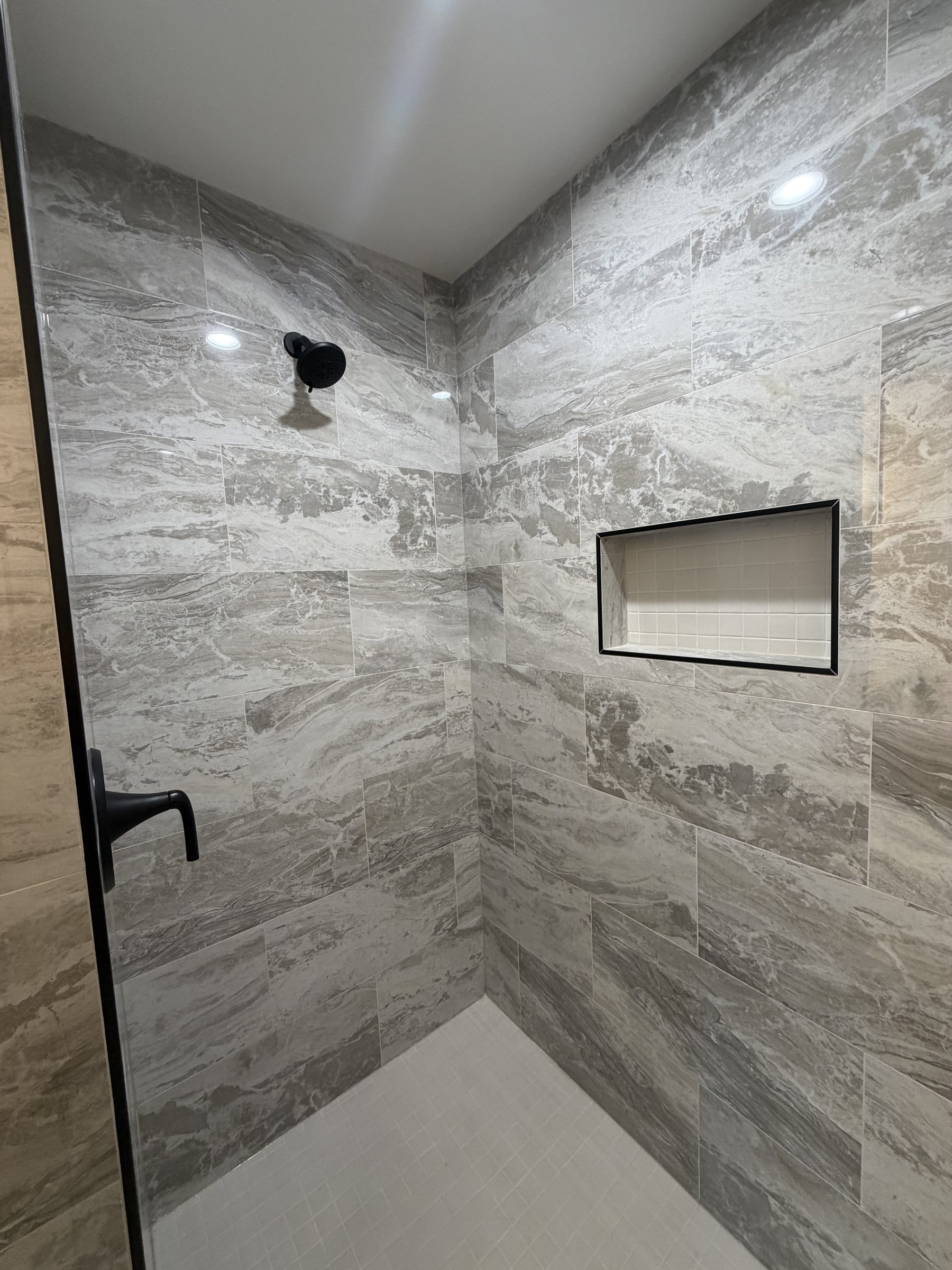Gray marble tile bathroom floor