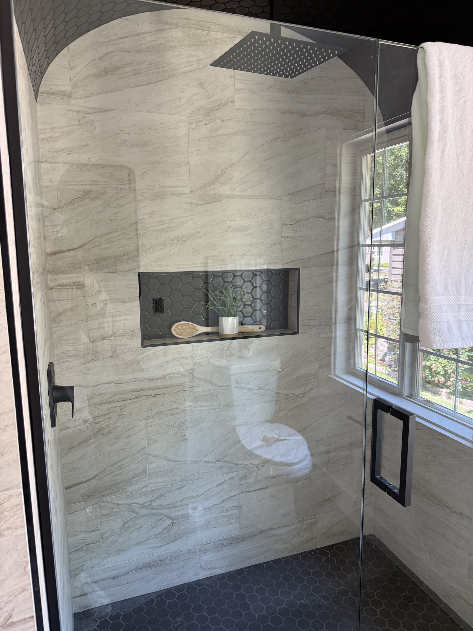 Large format porcelain tile shower