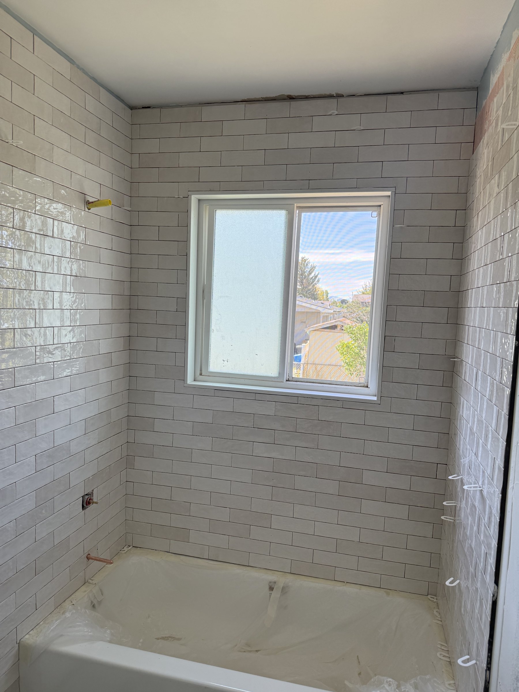 Subway tile shower in progress